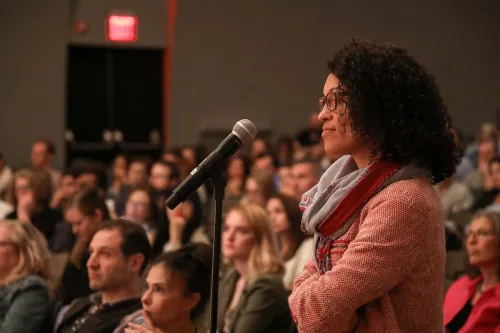 Audience speaking at zero waste food event.
