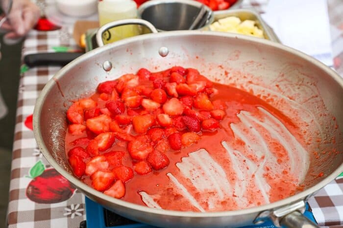 Strawberries reducing in pan