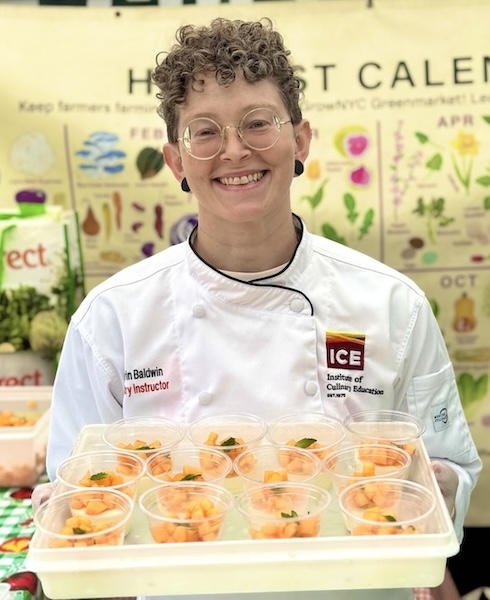 Chef Kierin Baldwin holding yogurt panna cotta with melon