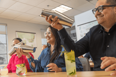Mixology students make margaritas and mojitos using shakers