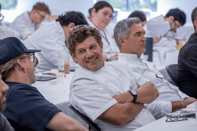 Chefs Ben Ford and Neil Fraser talk while attending Japanese Wagyu Panel