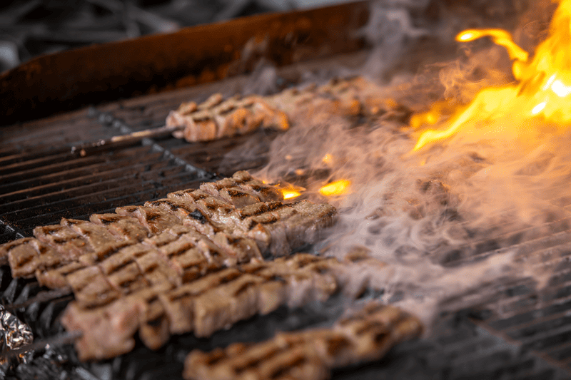 Japanese Wagyu skewers on a grill
