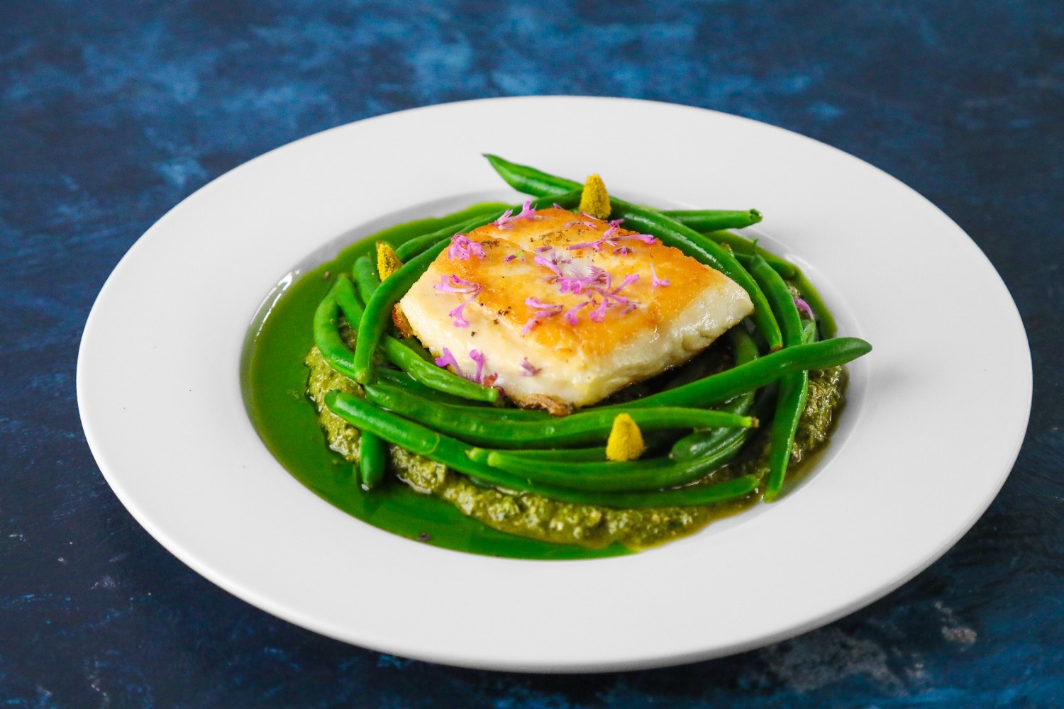 Plate of salmon and green beans.
