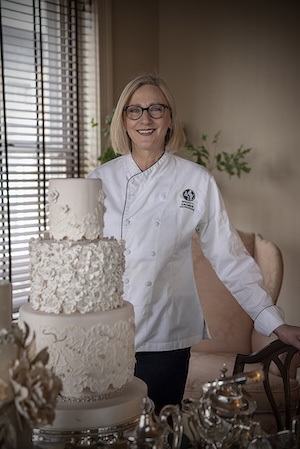 Wendy Kromer with wedding cake