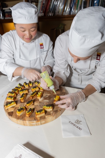 ICE culinary students making canapé at Autism Speaks NYC 2026.