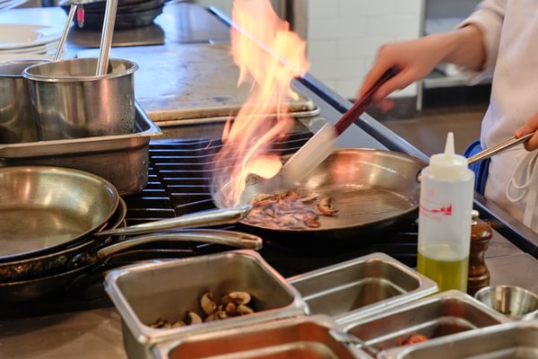 Flambe in a pan. 