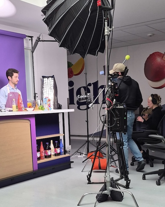  Cameras, lighting, and crew capture ICE alumnus Jon Chandler on set as he shares his expertise in culinary arts and science.