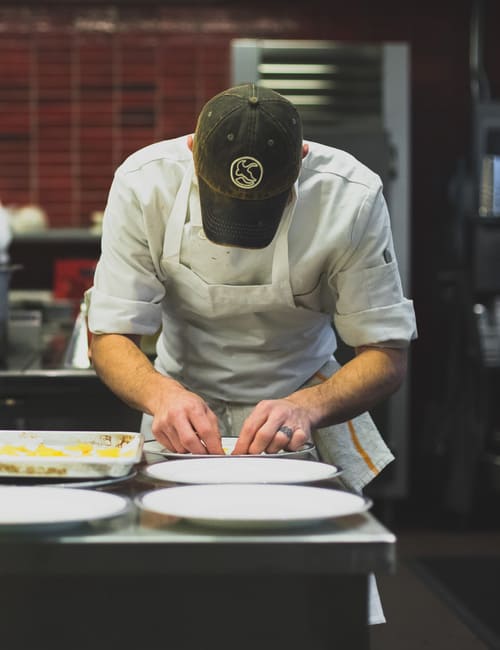 toxic workplace_chef preparing plates