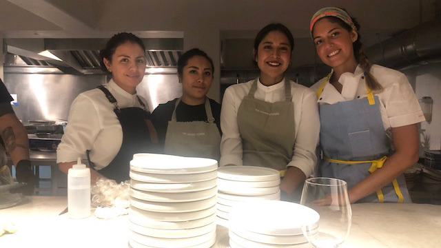 Adriana (right) with chefs at The Hidden Kitchen in Mexico City.
