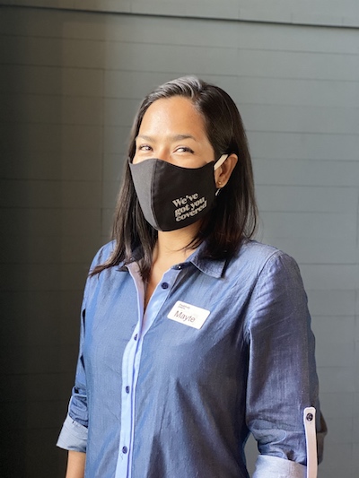 A masked hospitality professional at Canopy by Hilton Cancun