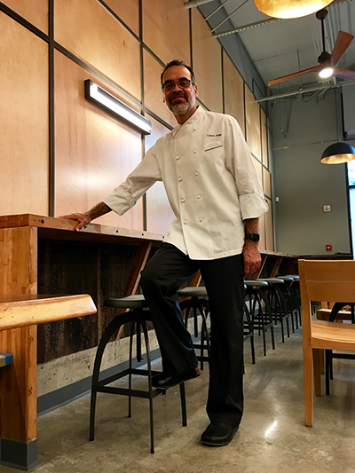 ICE alum Carlos Jorge in his Hawaii restaurant, Hi-Craft.