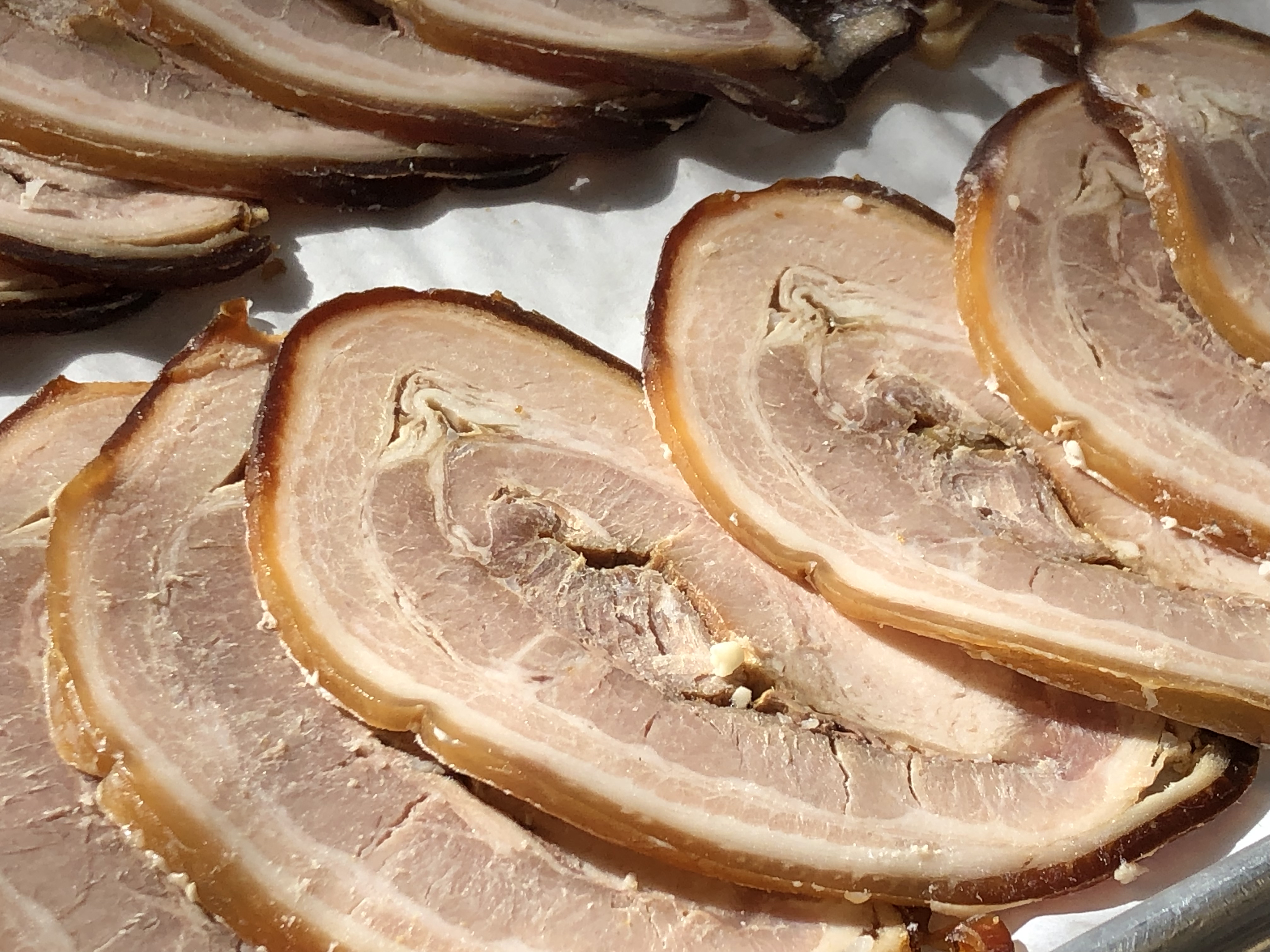 Slices of brown chashu pork