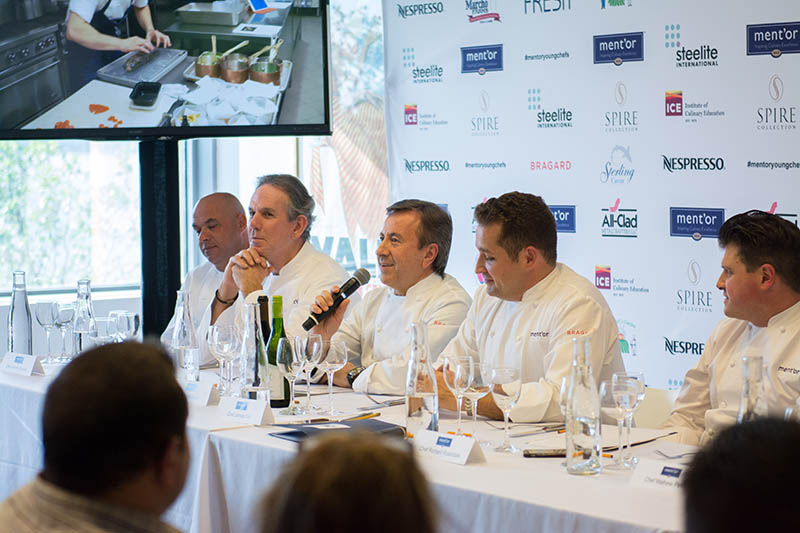 Daniel Boulud speaking at a Ment'or competition.