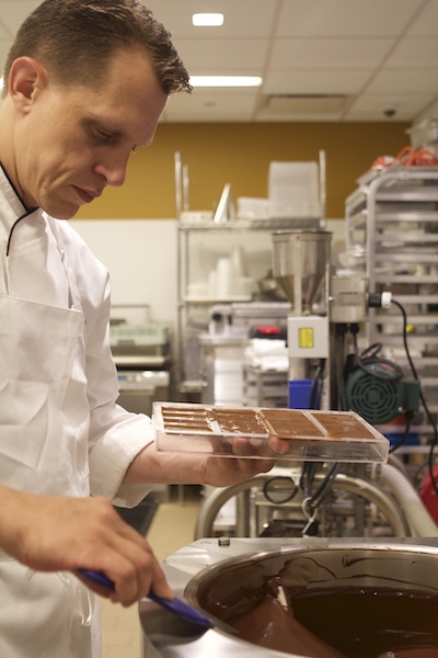Chef Michael making chocolate in the lab