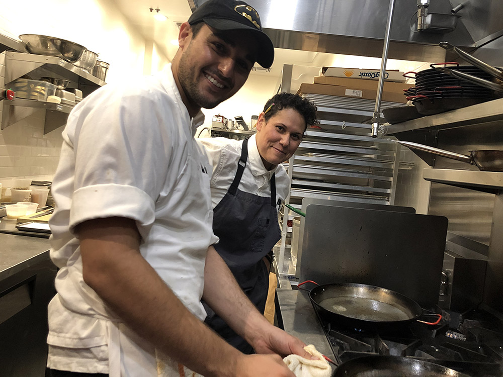 ICE alum Nick Huddleston works in the kitchen alongside Otono chef Teresa.