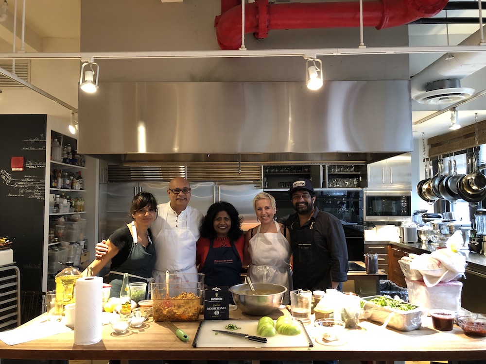 People cooking in the Saveur test kitchen