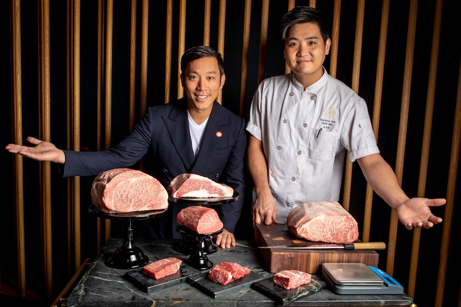 Simon Kim and Cote's executive chef with the steak cart