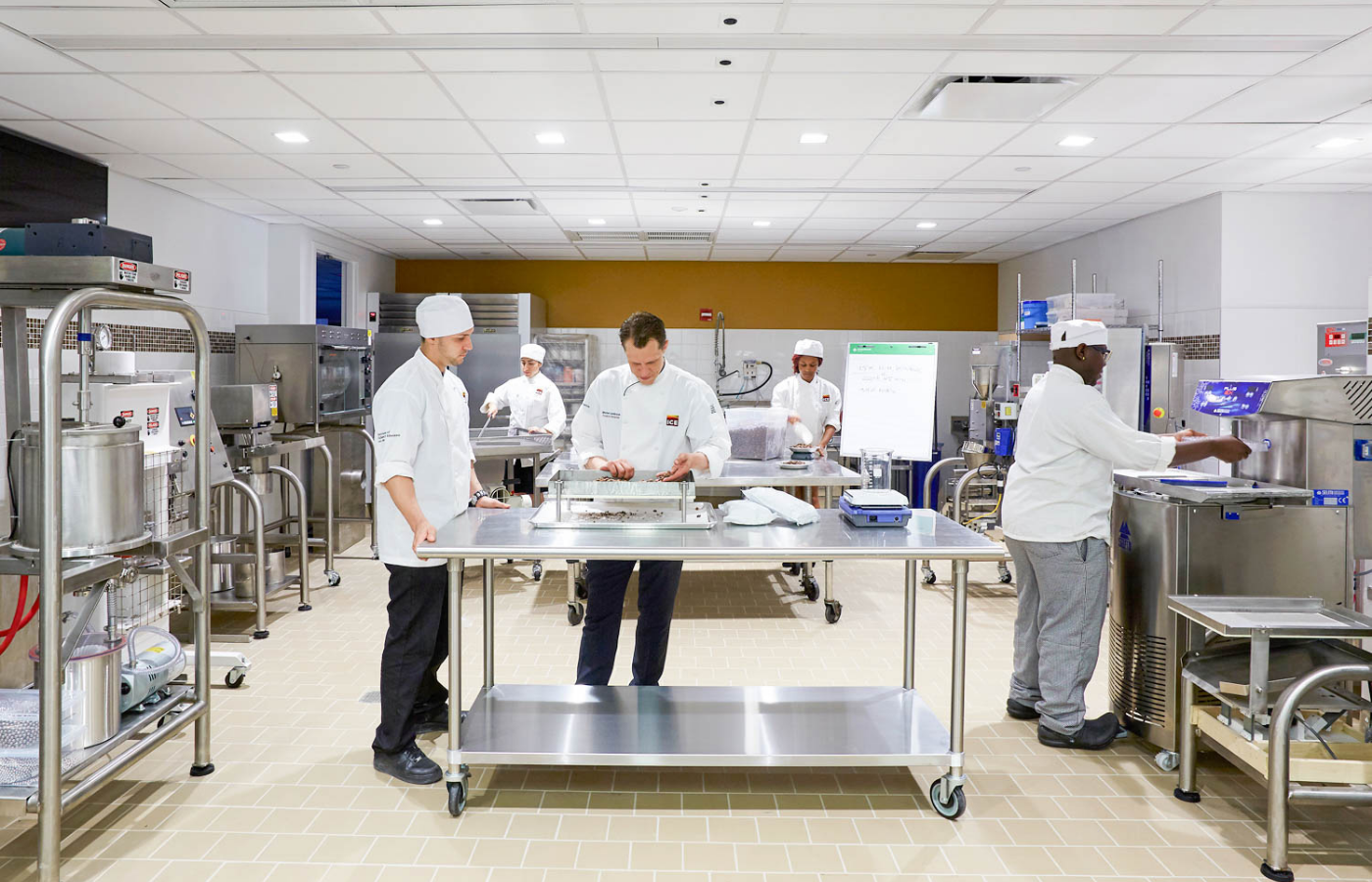 student and instructor in chocolate lab classroom