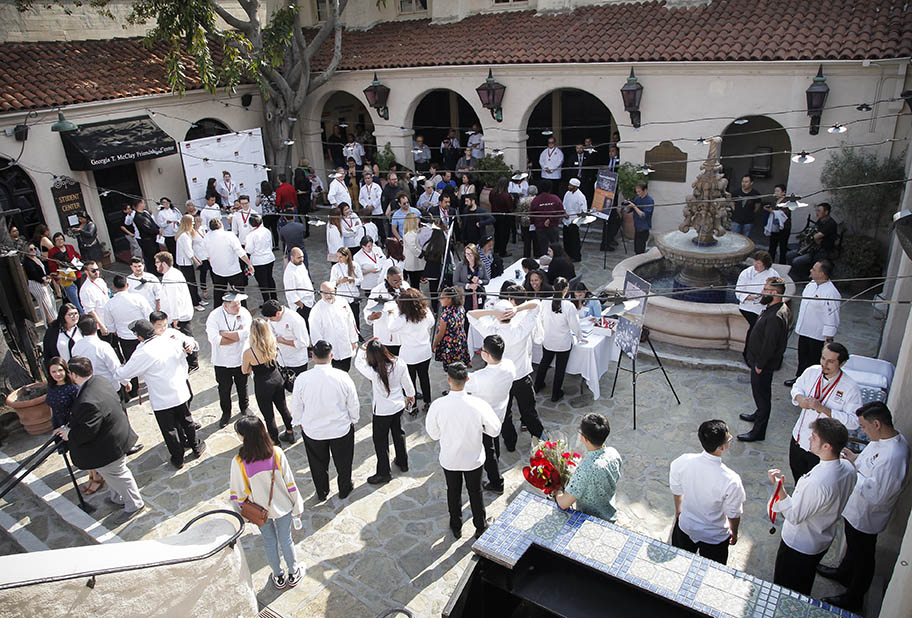 Students and supporters gather in the Pasadena Playhouse courtyard.