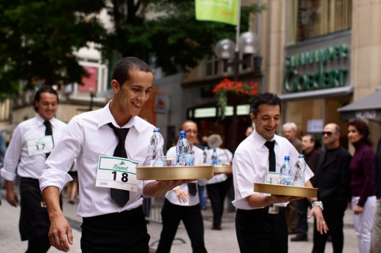 Waiters engage in a friendly race in Luxembourg. Photo Credit: Gwenaël Piaser