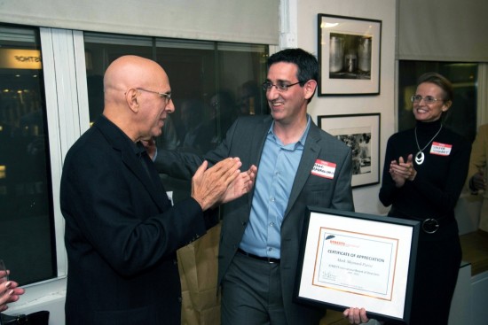 Neal Bermas (left) and Sondra Stewart (right) presenting Mark Maynard-Parisi, Managing Partner of the Blue Smoke group at Union Square Hospitality Group, with a certificate of appreciation.