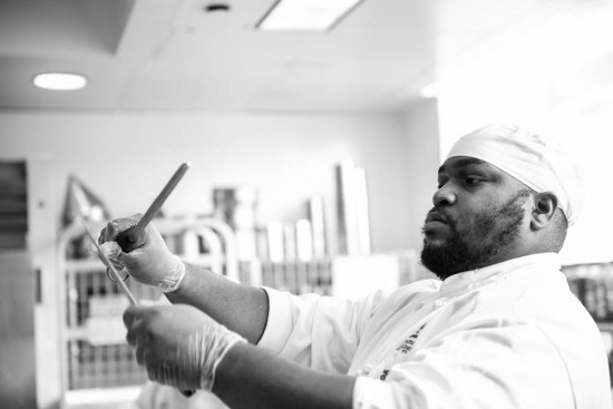 professional chef sharpening their knives