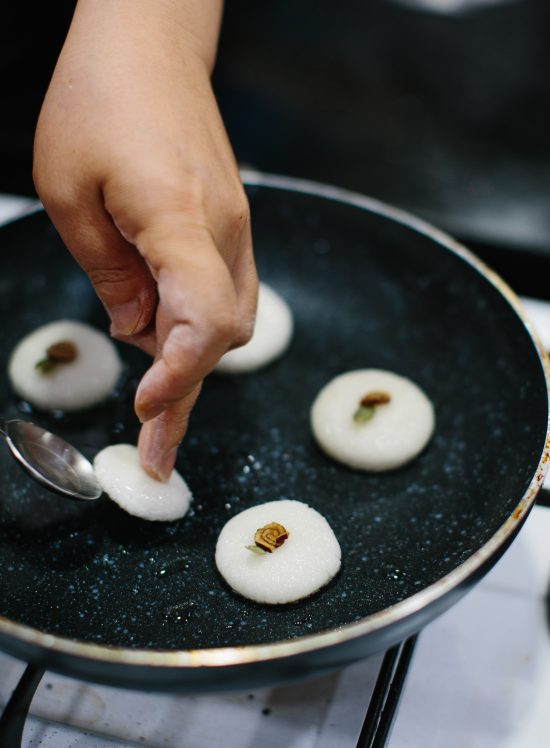 chef preparing rice cake in seoul south korea