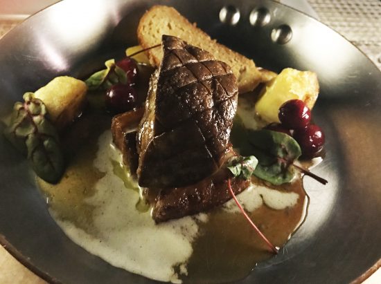 Restaurant Toast (Boudin noir with fondue of shallots, apples, baby arugula and aged cheddar galette)