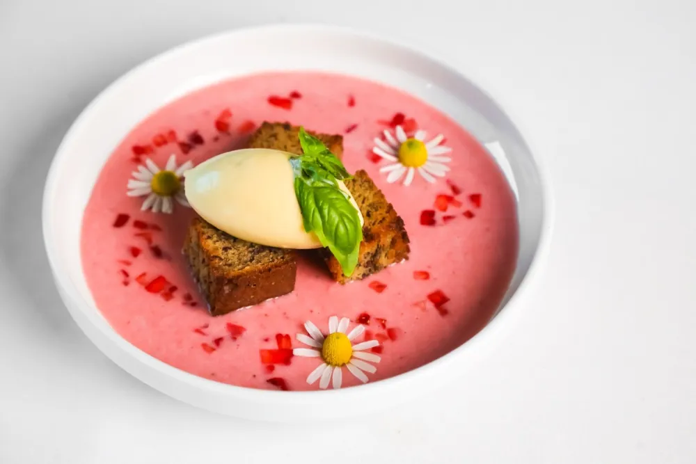 Strawberry soup with banana bread croutons and goat cheese ice cream