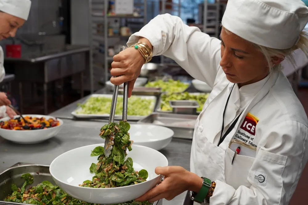 ICE student plating salad