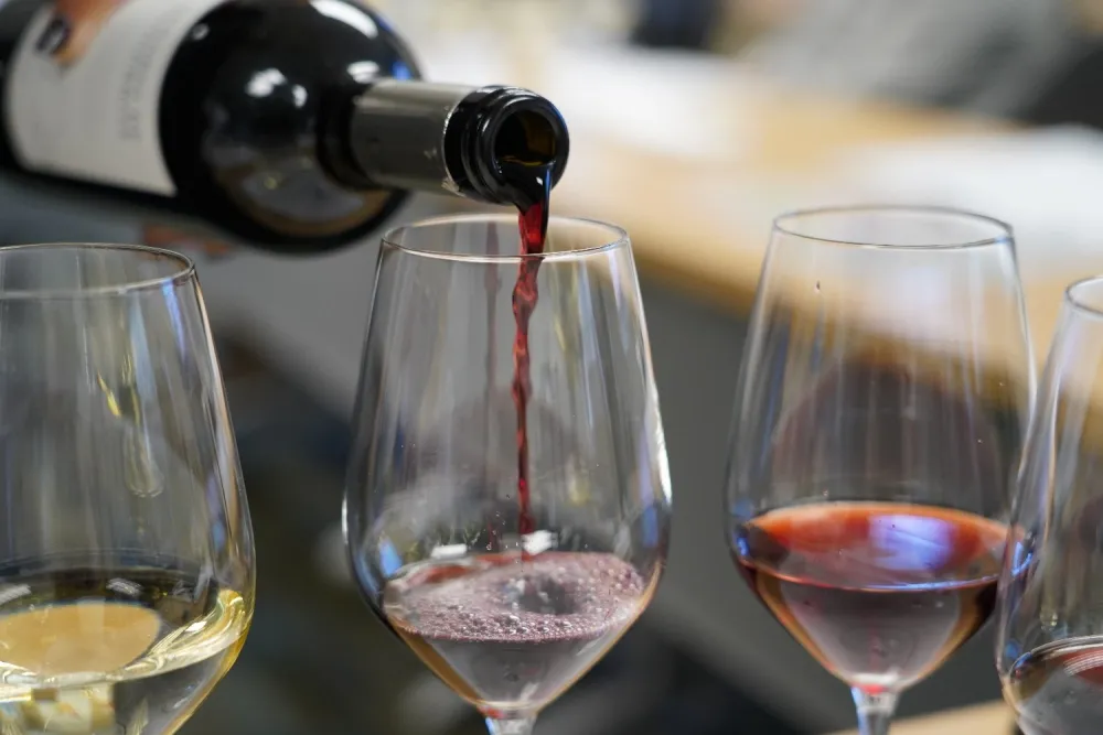 Wine pouring into a glass.