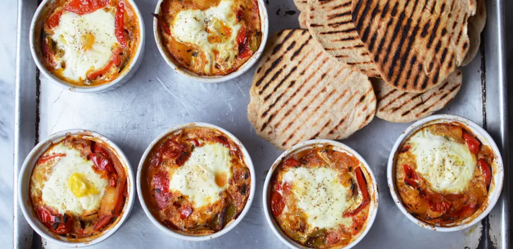 Peperonata baked eggs and spelt flatbreads