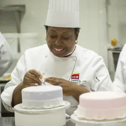 toba garrett teaching pastry arts students in culinary school