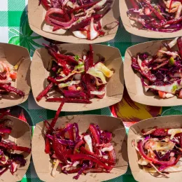 Individual servings of cabbage and beet salad plated