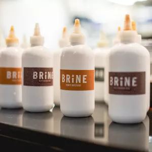 Brine restaurant hosts a sauce bar with five signature sauces.