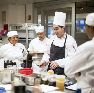 Chef Chris Gesualdi teaching culinary arts in New York