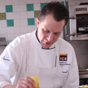 Chef Michael Laiskonis demonstrating for culinary students in New York