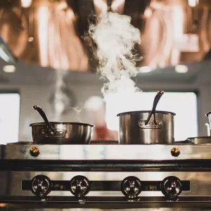 pots and pans on a professional kitchen stove