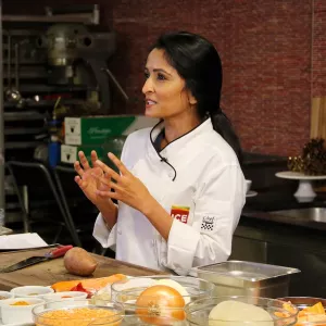 Chef Palak Patel teaching a virtual cooking event at ICE