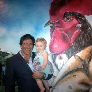 Tony Trincanello in front of La Roost' mural