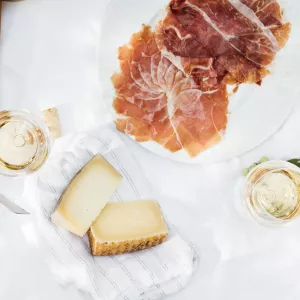 cheese Meat and Wine on a table