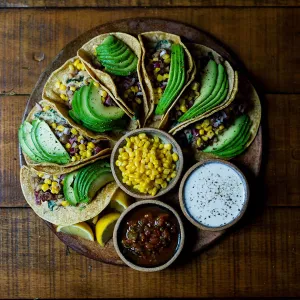 Tacos with avocado and corn
