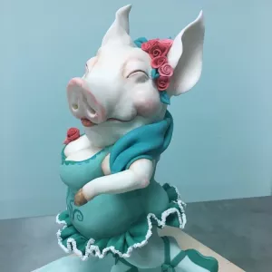 Carved cake of a ballerina pig
