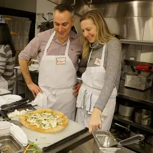 A couple takes a pizza class at ICE