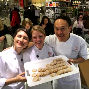 Julia Johnson and Elena Ubeda pose with another ICC student and their shortbread cookies