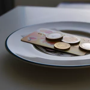 check and cash on table at a restaurant