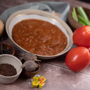 Okra stew and ingredients