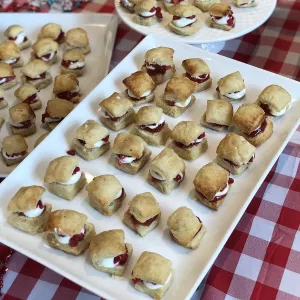 Strawberry shortcake bites are served on platters.