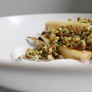 Roasted parsnips with macademia nut gremolata