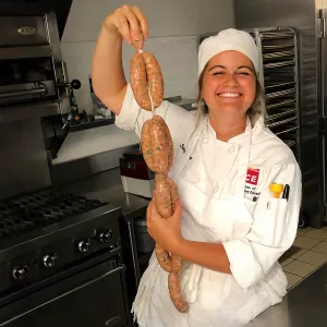 Sara Tane made sausage in Mod 5 of Culinary Arts